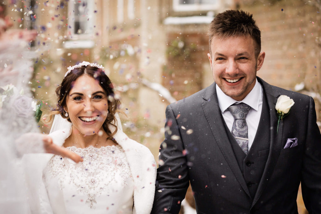 Bride and Groom confetti walk at Tylney Hall
