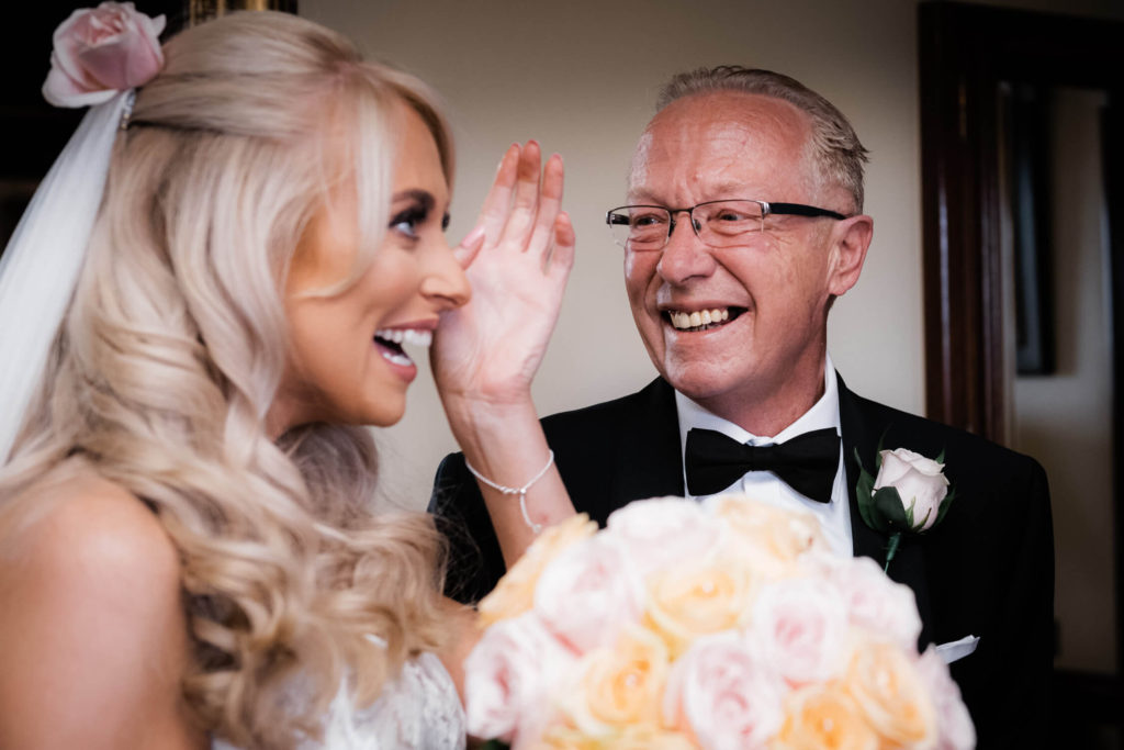 Bride and father shed a tear at Stoke Park