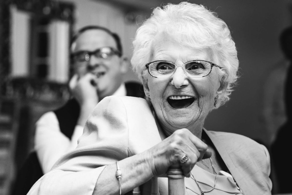 Gran laughing at wedding at Warwick House