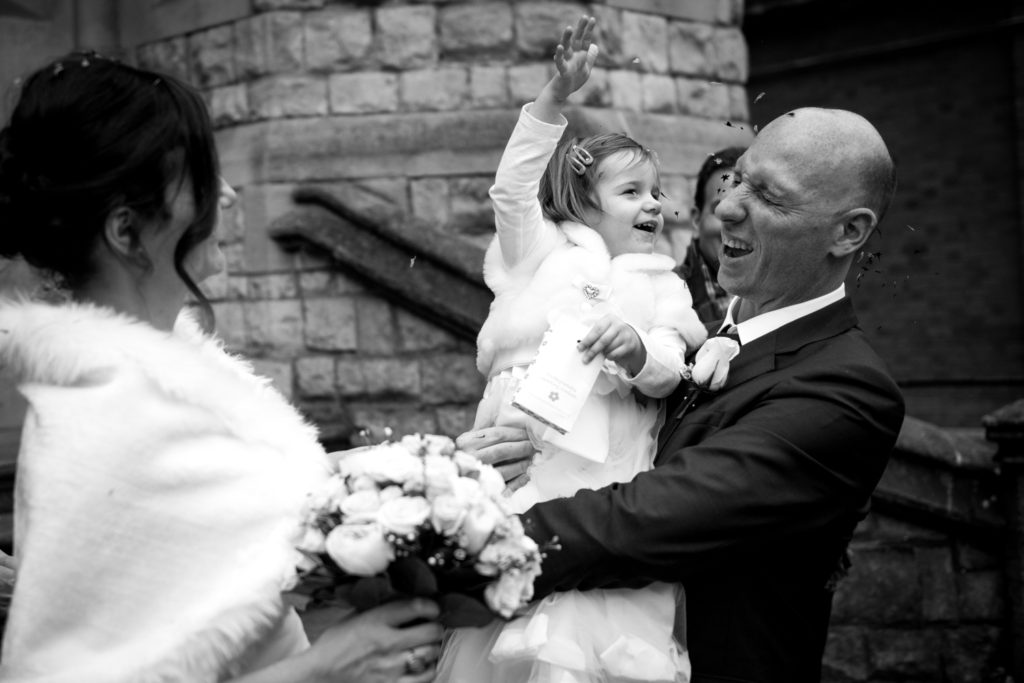 daughter thrown confetti on groom